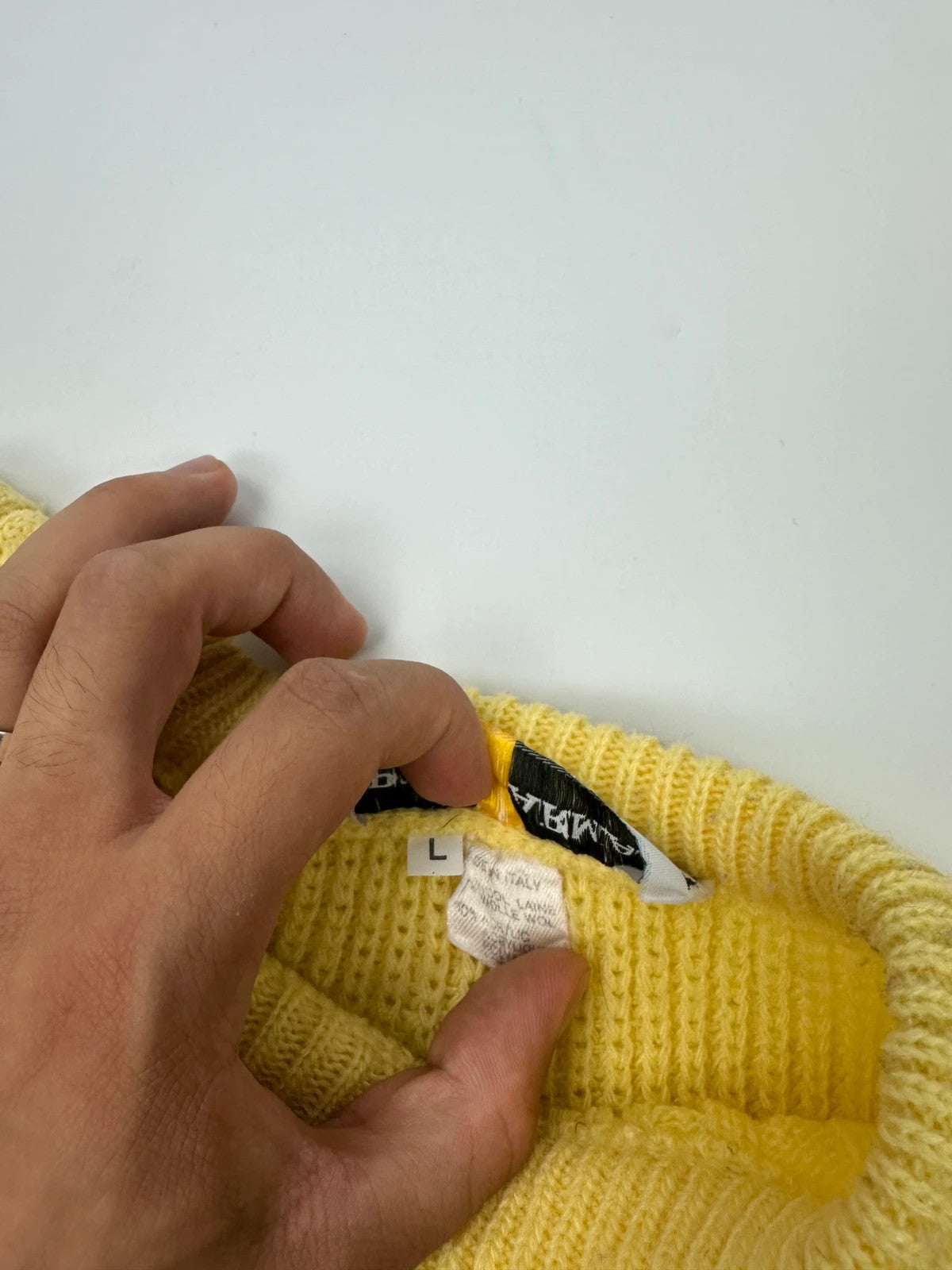 Emporio Armani yellow cable knit sweater with 90's design and classic logo detail.