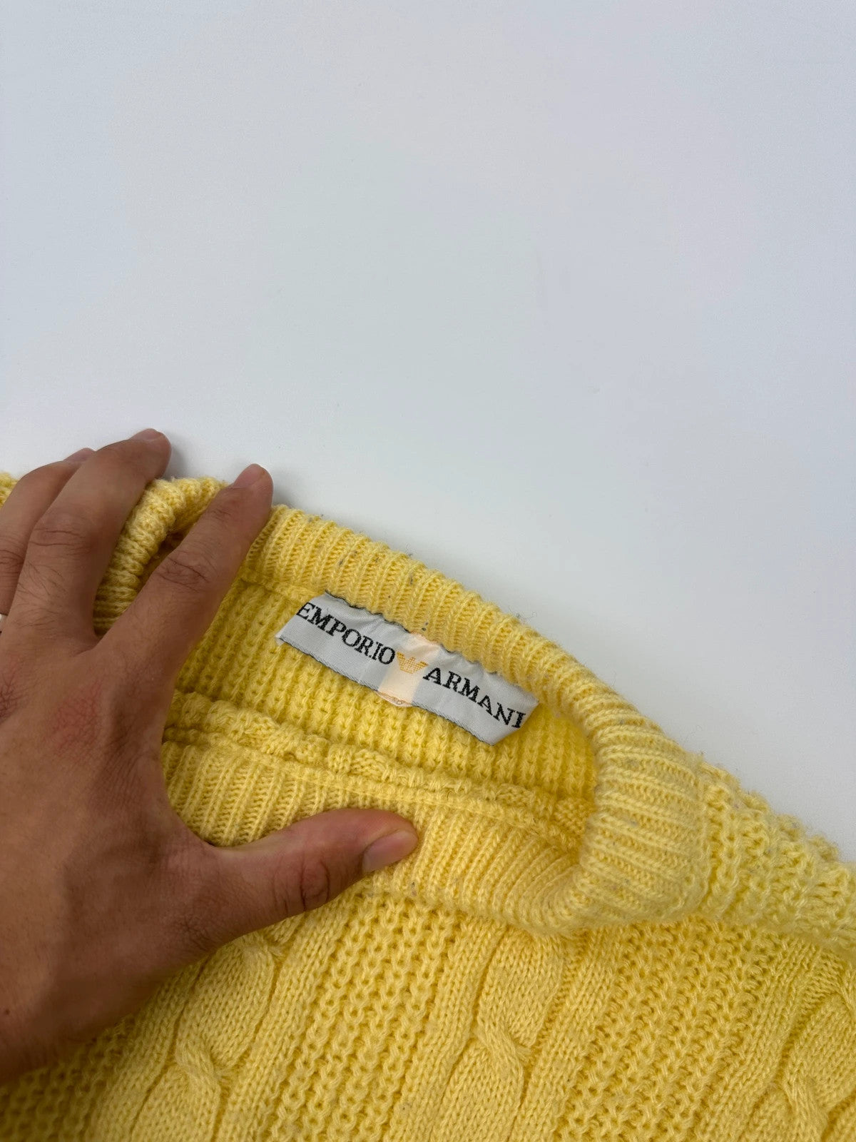 Emporio Armani yellow cable knit sweater with 90's design and classic logo detail.