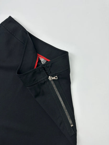 Prada black wool mid-length skirt with minimalist design and linearossa logo.