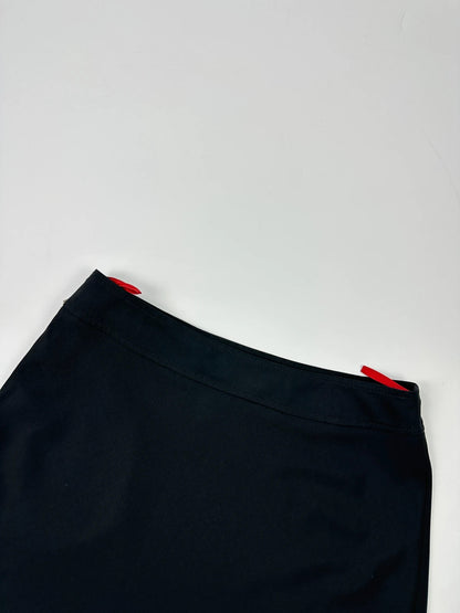 Prada black wool mid-length skirt with minimalist design and linearossa logo.