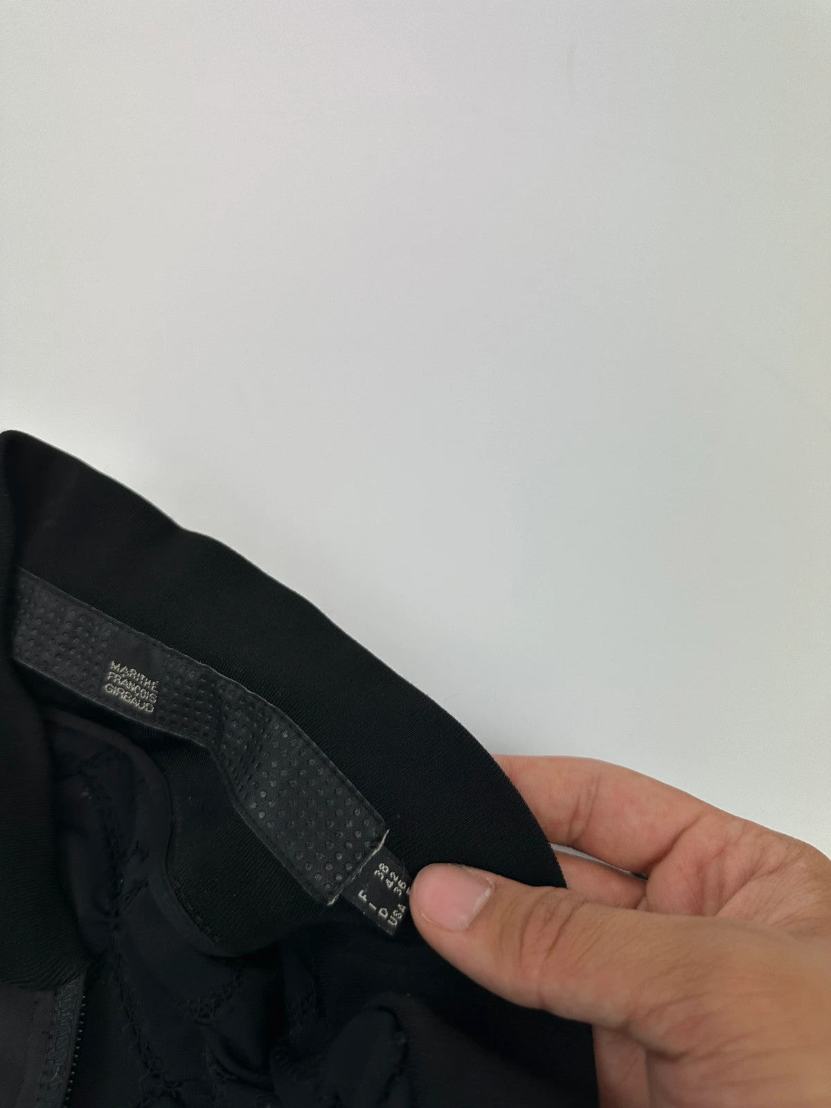 Marithé François Girbaud black fitted jacket with 2000s embroidery and minimalist design.