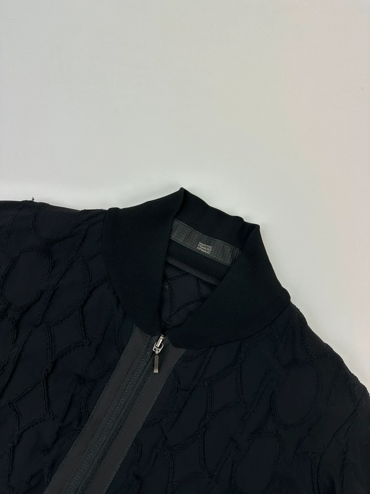 Marithé François Girbaud black fitted jacket with 2000s embroidery and minimalist design.