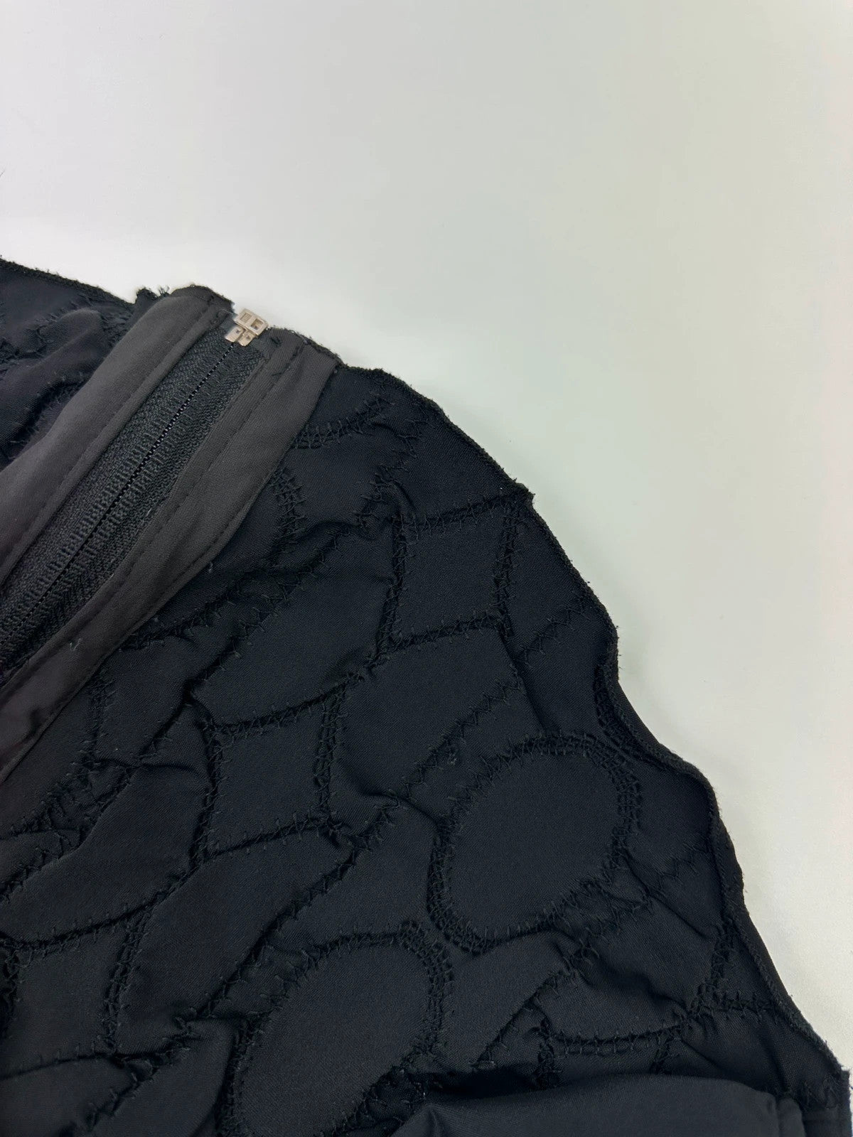 Marithé François Girbaud black fitted jacket with 2000s embroidery and minimalist design.