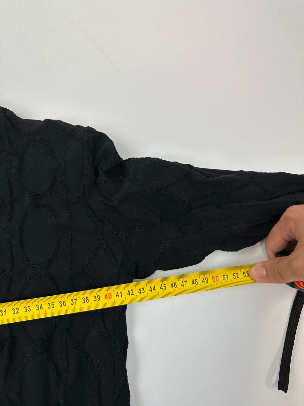 Marithé François Girbaud black fitted jacket with 2000s embroidery and minimalist design.