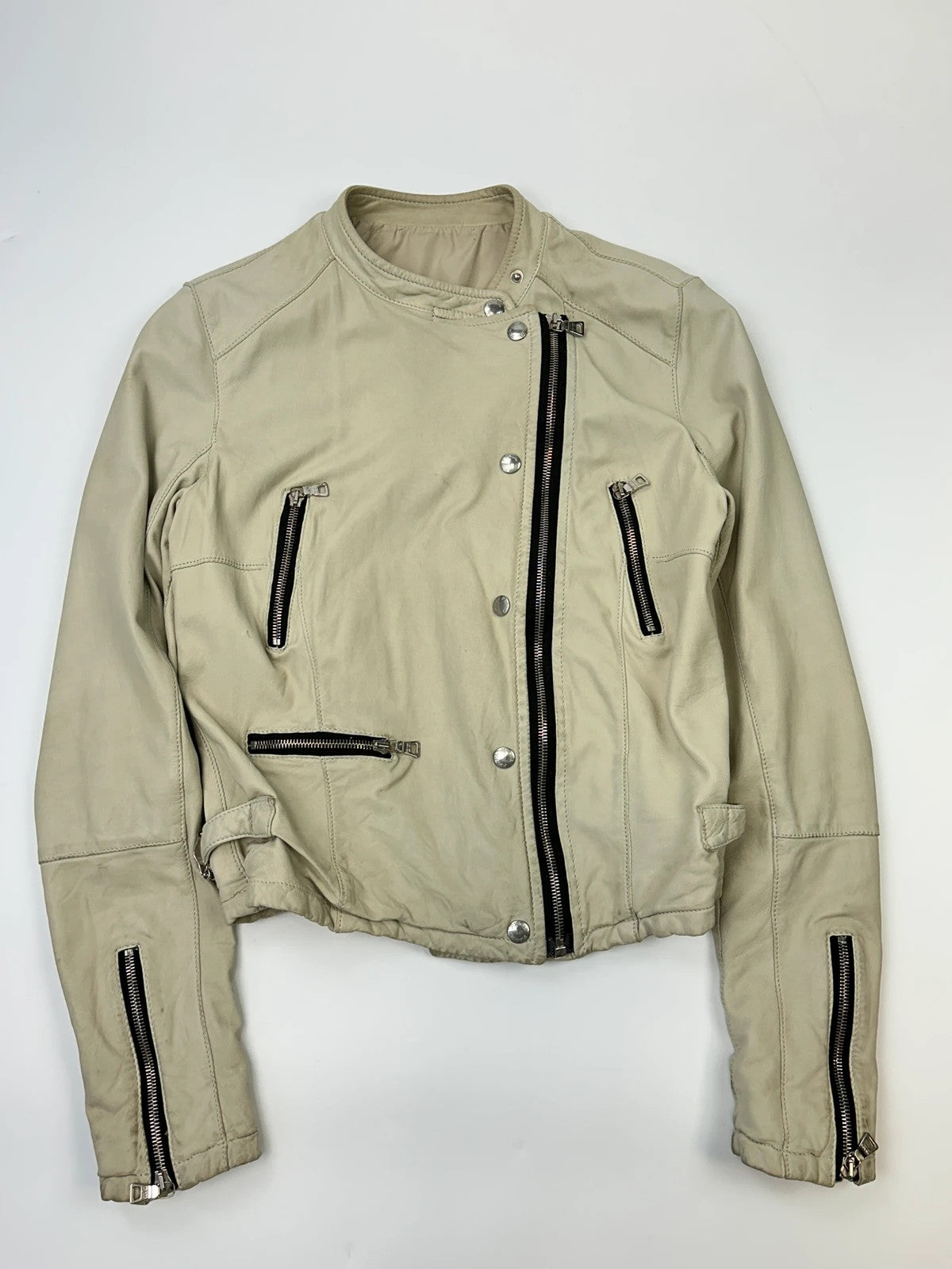 Prada beige leather fitted jacket with multi pockets and logo detailing.