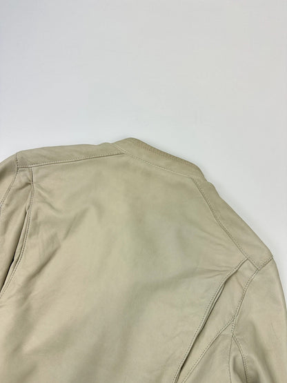 Prada beige leather fitted jacket with multi pockets and logo detailing.