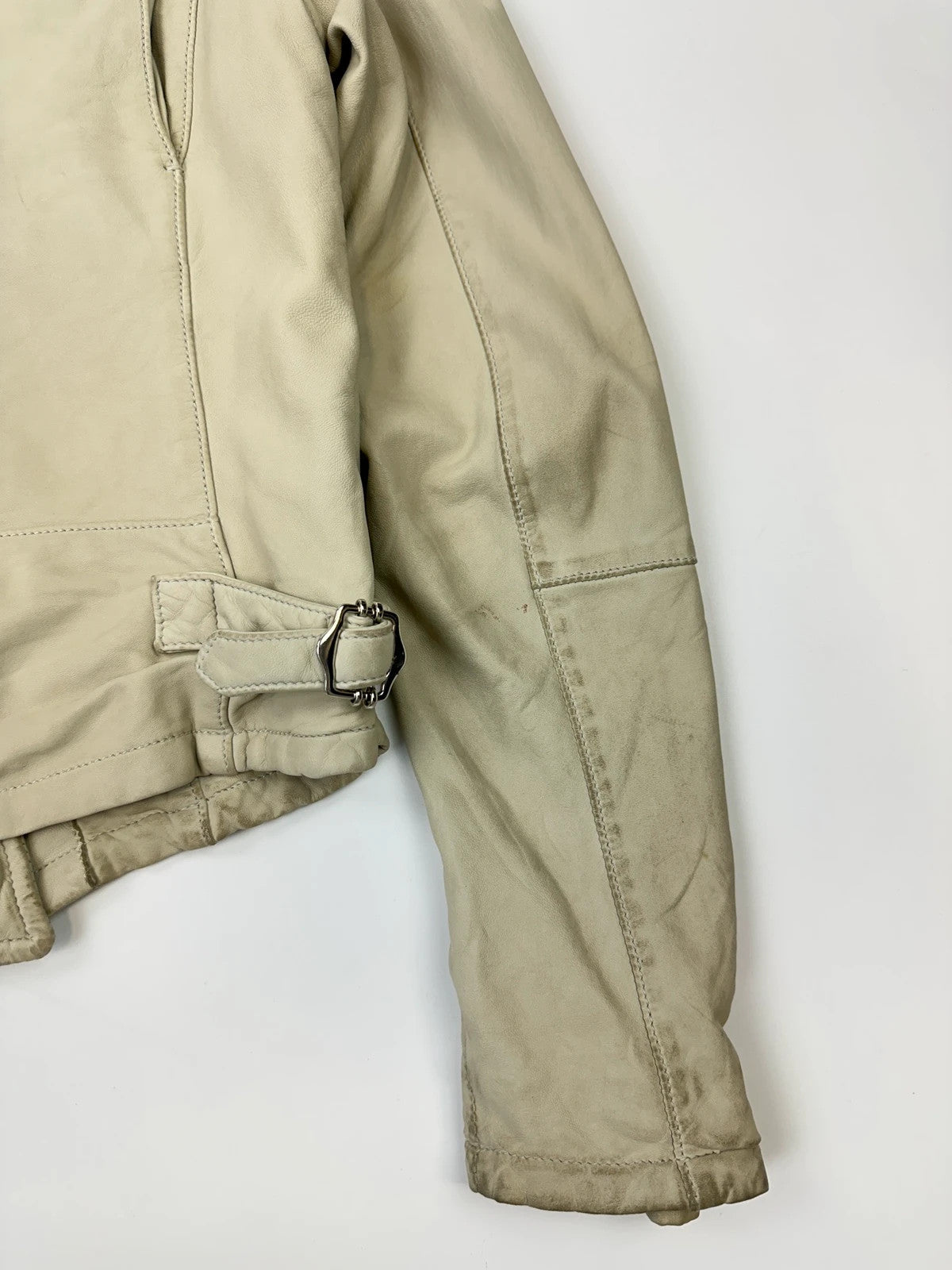 Prada beige leather fitted jacket with multi pockets and logo detailing.