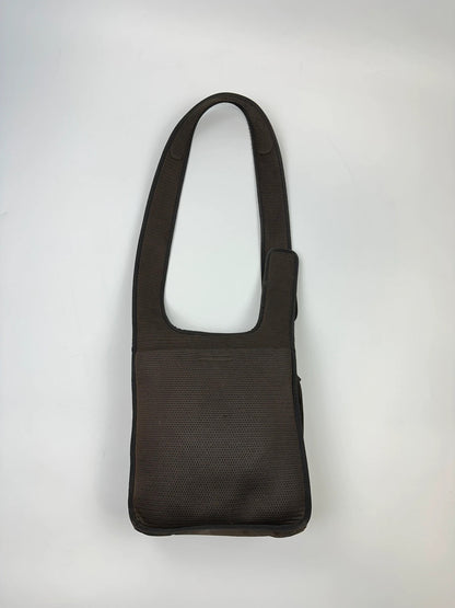 Miu Miu brown suede and mesh crossbody bag with logo detail and vintage design.