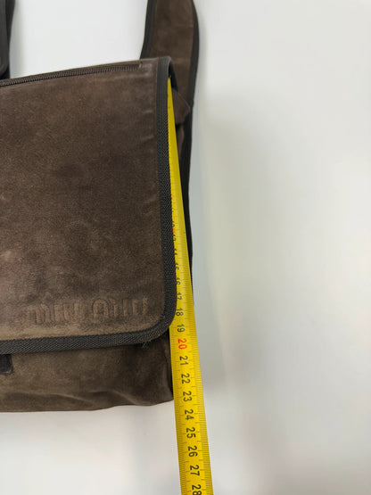 Miu Miu brown suede and mesh crossbody bag with logo detail and vintage design.
