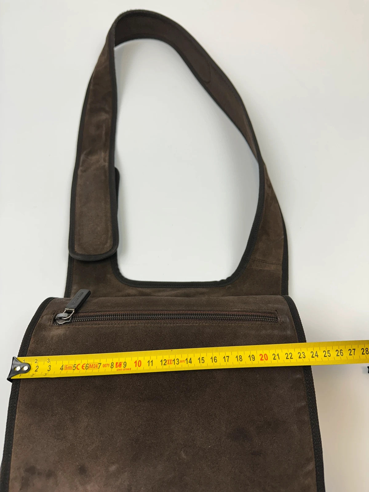 Miu Miu brown suede and mesh crossbody bag with logo detail and vintage design.