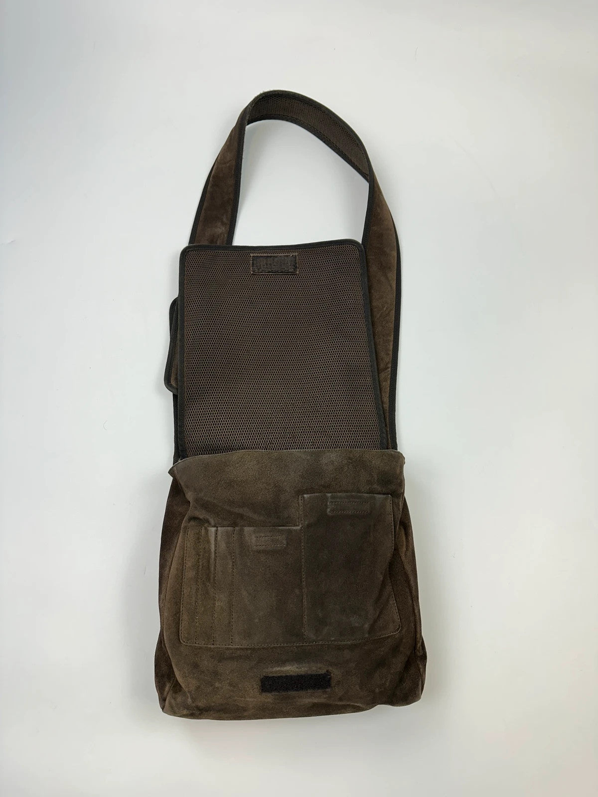 Miu Miu brown suede and mesh crossbody bag with logo detail and vintage design.
