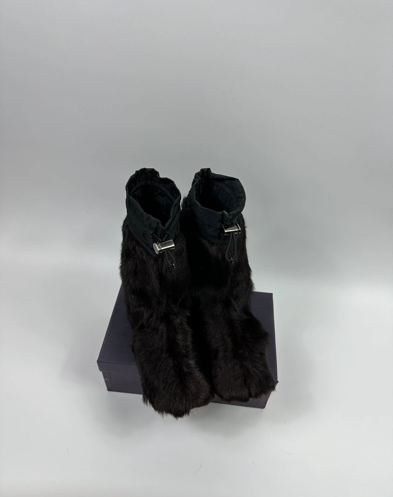 Prada brown fur Yeti boots with logo detail, vintage 1999 runway collection.