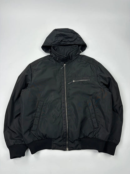 Prada black bomber jacket with hidden hood, minimalist design, luxury runway archive.