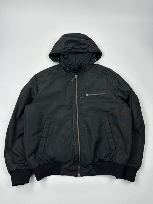 Prada black bomber jacket with hidden hood, minimalist design, luxury runway archive.