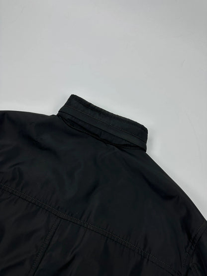 Prada black bomber jacket with hidden hood, minimalist design, luxury runway archive.