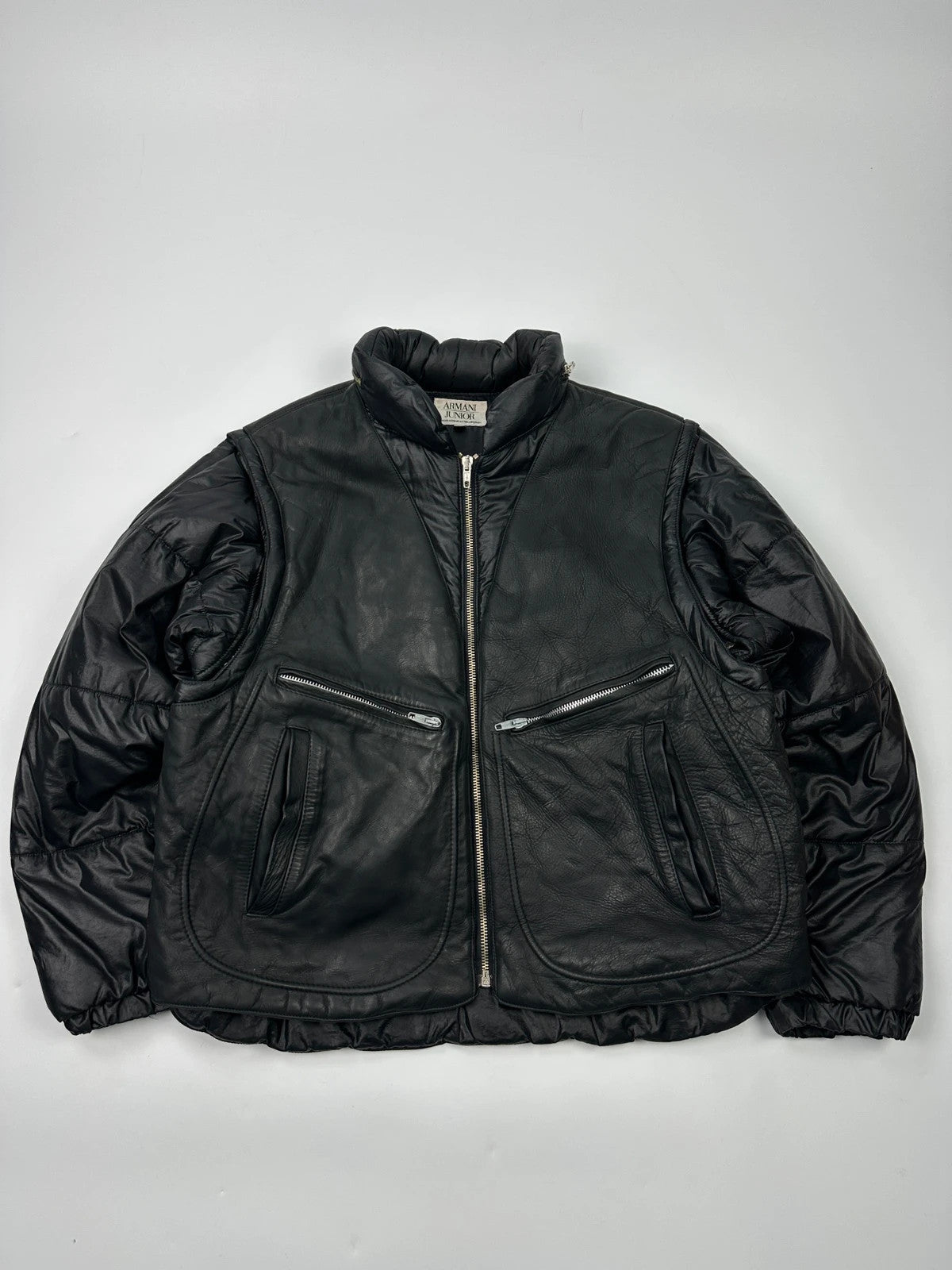 Armani black puffer bomber jacket, leather and nylon, removable sleeves, vintage 90s style.