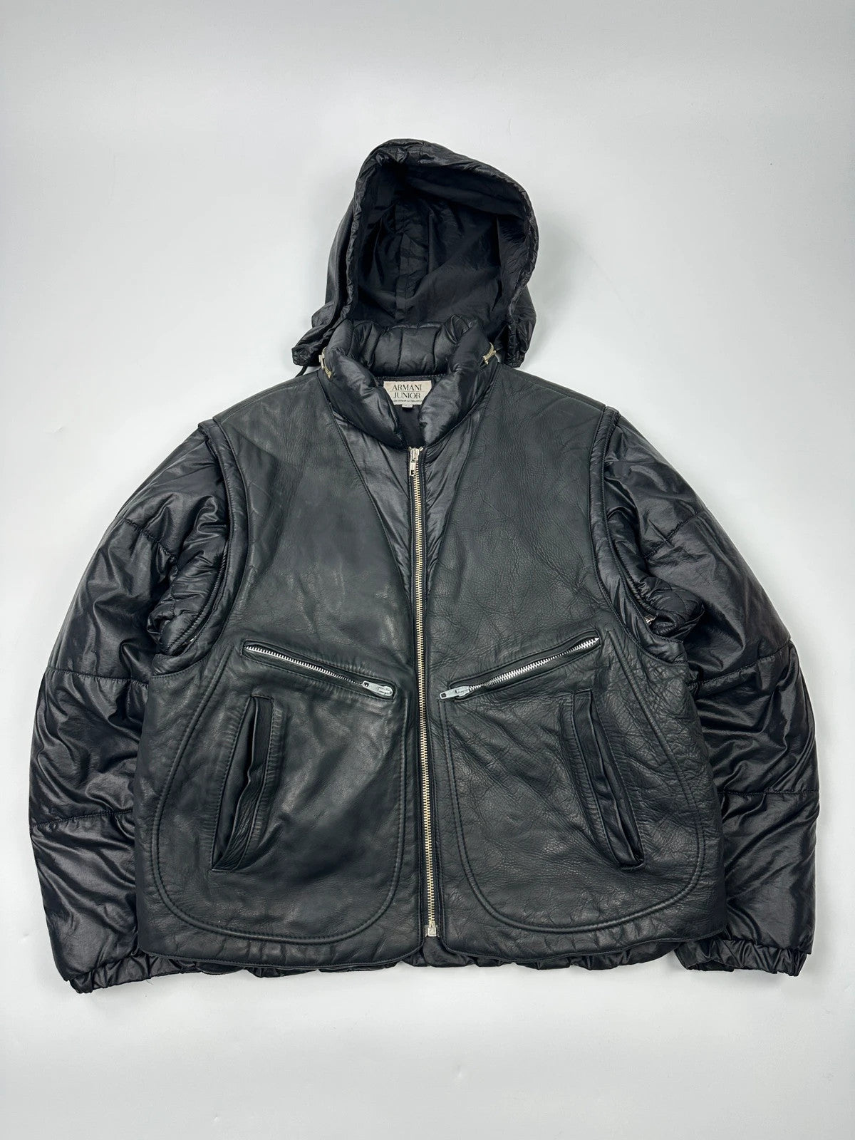 Armani black puffer bomber jacket, leather and nylon, removable sleeves, vintage 90s style.