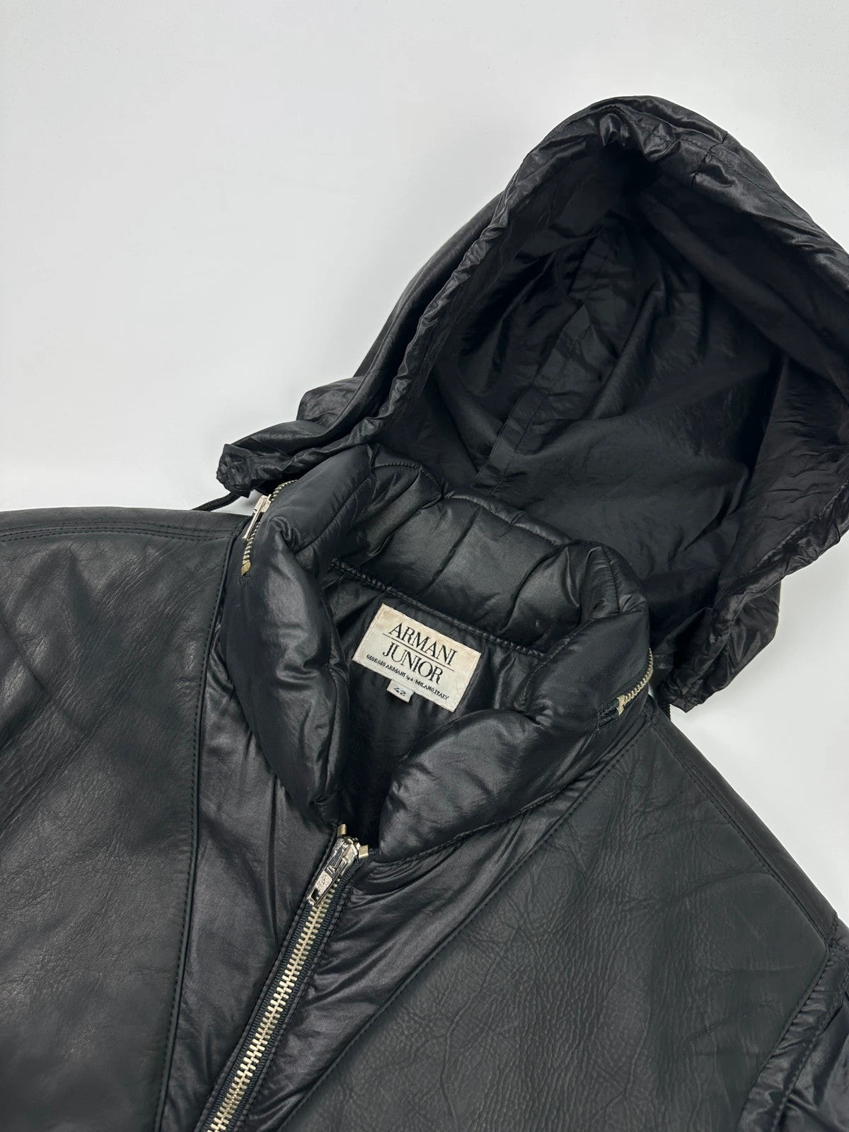 Armani black puffer bomber jacket, leather and nylon, removable sleeves, vintage 90s style.