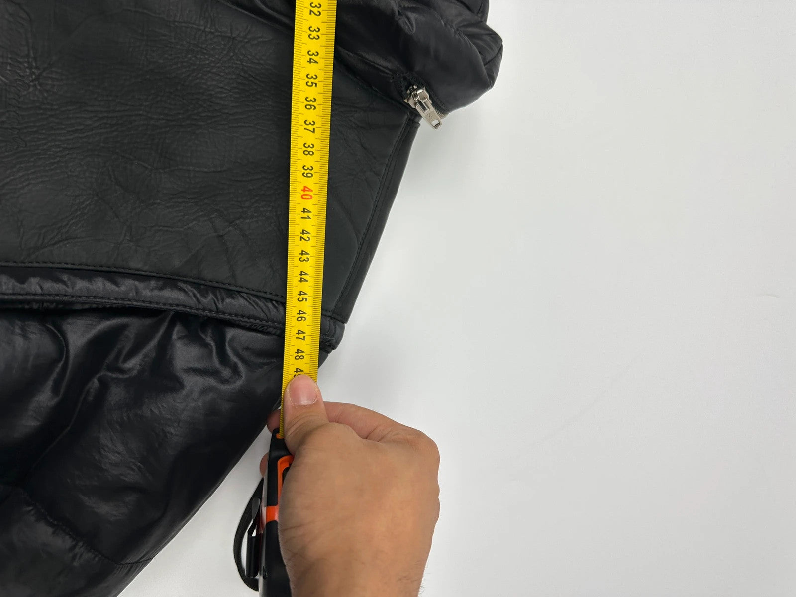 Armani black puffer bomber jacket, leather and nylon, removable sleeves, vintage 90s style.