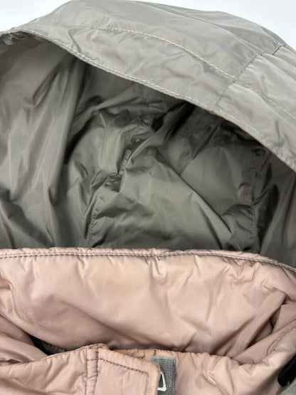 Prada orange and pink puffer vest with retractable hood and logo detailing.