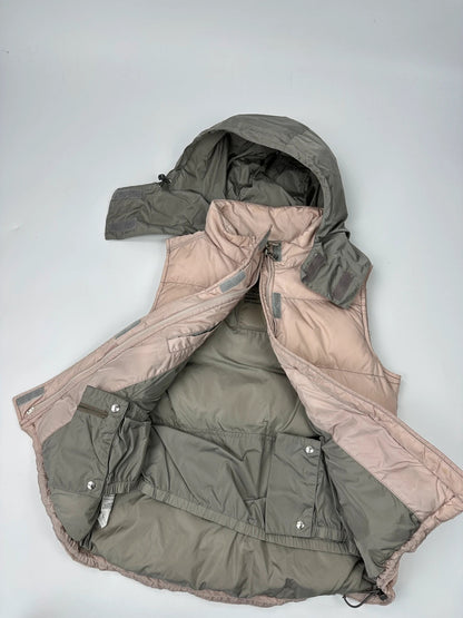 Prada orange and pink puffer vest with retractable hood and logo detailing.