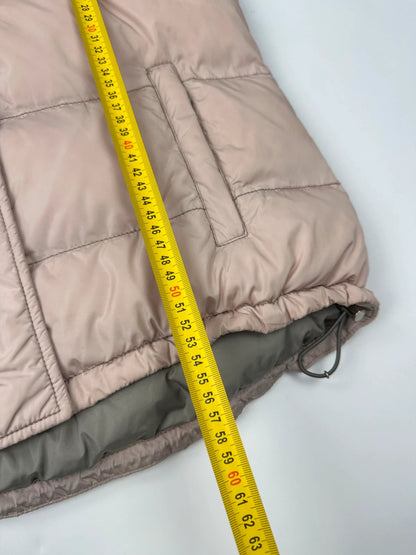 Prada orange and pink puffer vest with retractable hood and logo detailing.
