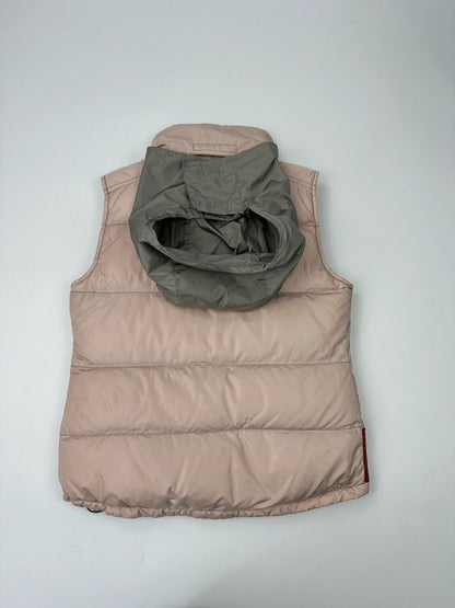 Prada orange and pink puffer vest with retractable hood and logo detailing.