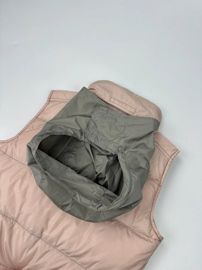 Prada orange and pink puffer vest with retractable hood and logo detailing.