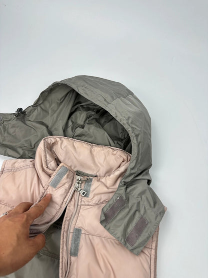 Prada orange and pink puffer vest with retractable hood and logo detailing.