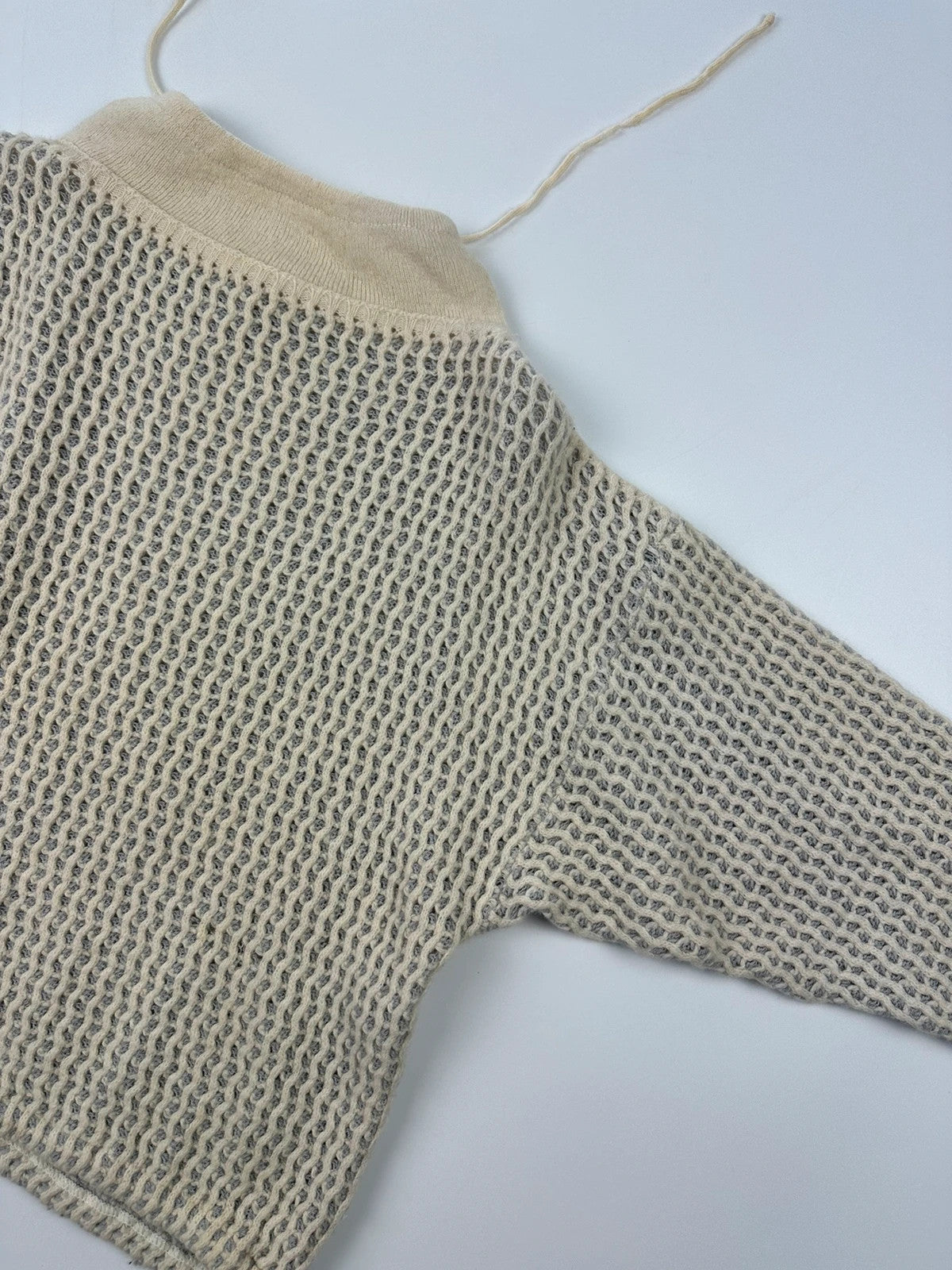 Marithé François Girbaud cream grey turtleneck sweater textured mesh double knit with adjustable ties.