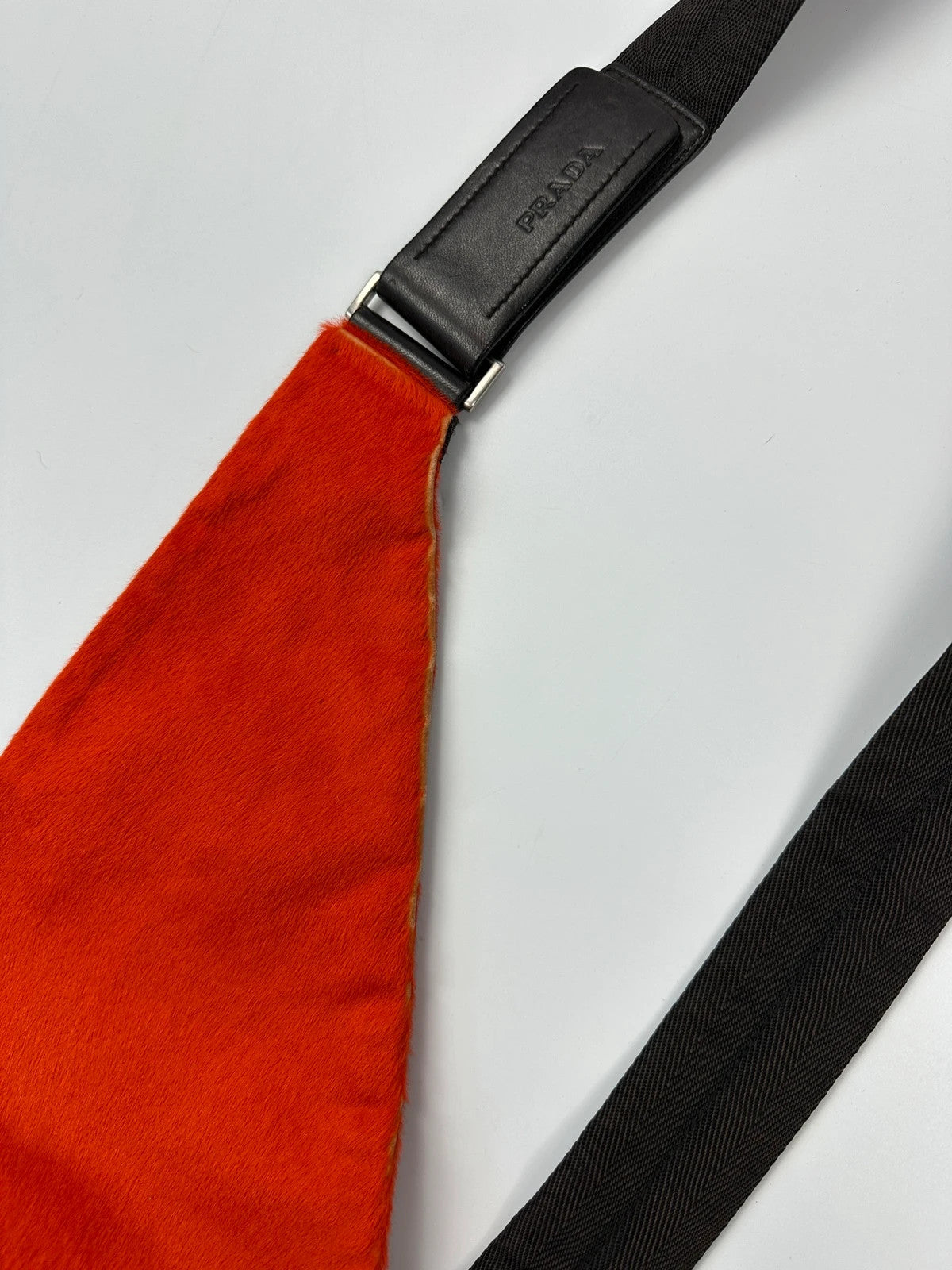 Prada orange fur crossbody sling bag with logo detail from FW99 collection.