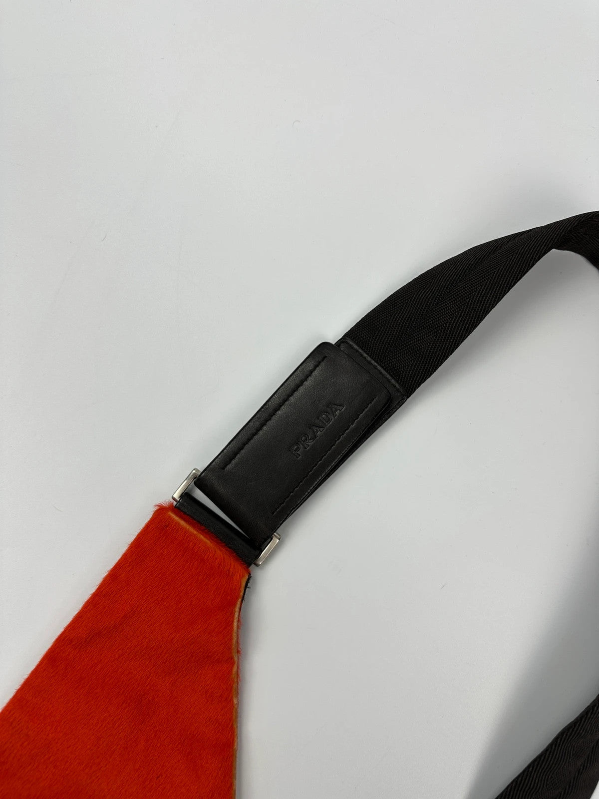 Prada orange fur crossbody sling bag with logo detail from FW99 collection.
