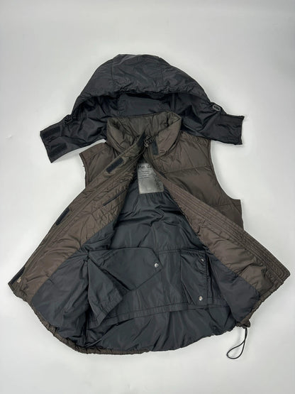 Prada brown puffer vest with retractable hood and linearossa logo details.
