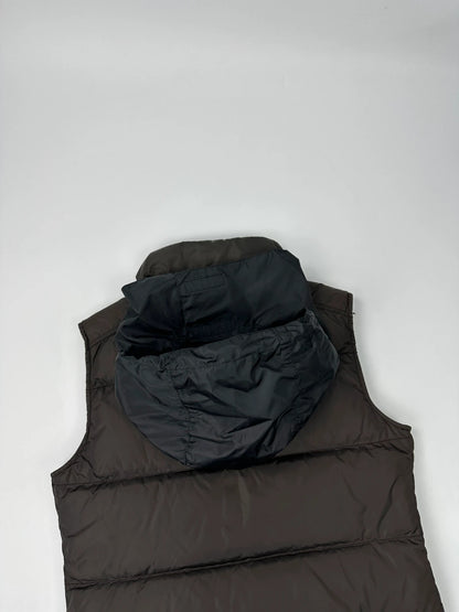 Prada brown puffer vest with retractable hood and linearossa logo details.