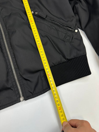 Prada black bomber jacket with leather details and hidden hood from FW2009 collection.