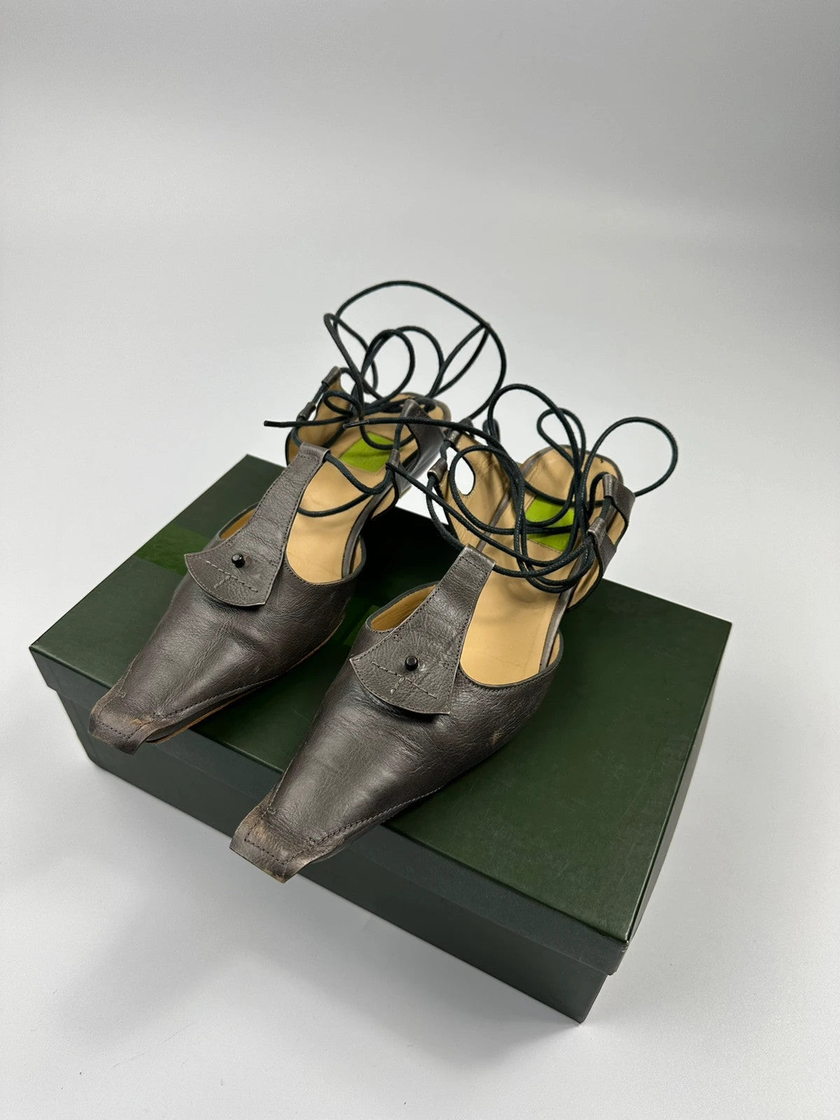 Marithé Francois Girbaud brown grey leather slingback heels with round toe and lace details.