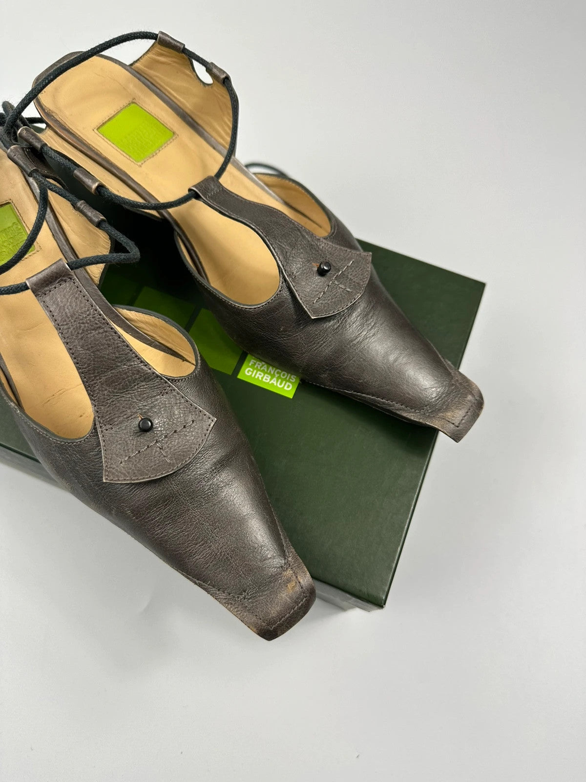 Marithé Francois Girbaud brown grey leather slingback heels with round toe and lace details.