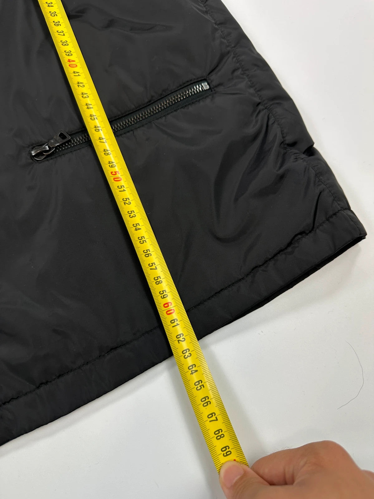 Prada black padded vest, nylon material, minimalist design, vintage 2003 collection.