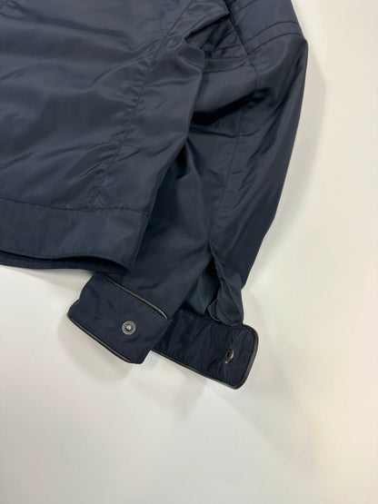 Prada bomber jacket navy blue nylon with reinforced details and minimalist design.