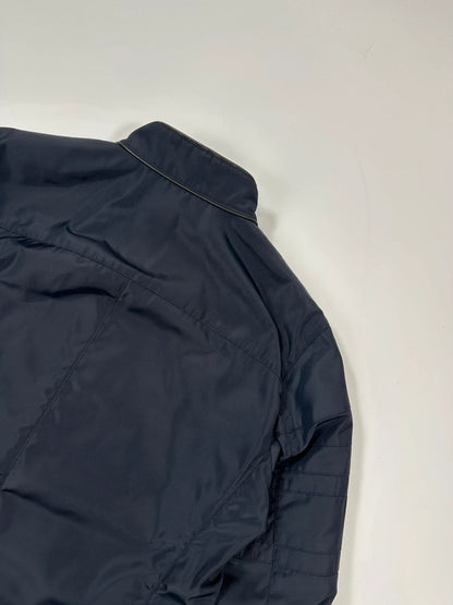 Prada bomber jacket navy blue nylon with reinforced details and minimalist design.