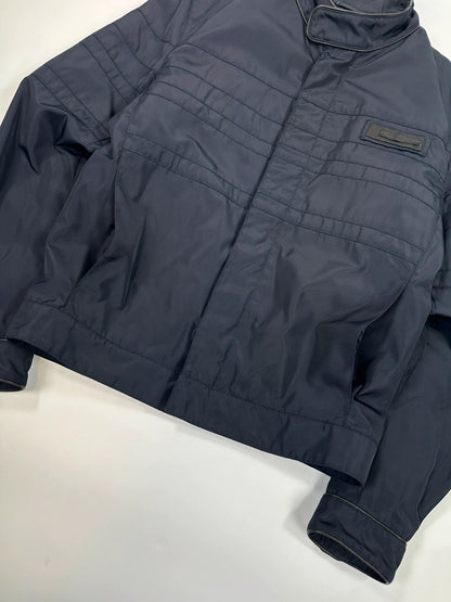 Prada bomber jacket navy blue nylon with reinforced details and minimalist design.
