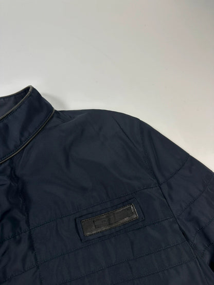 Prada bomber jacket navy blue nylon with reinforced details and minimalist design.