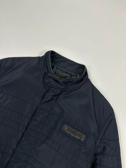 Prada bomber jacket navy blue nylon with reinforced details and minimalist design.
