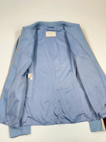 Prada blue striped jacket in nylon and silk with logo detailing.