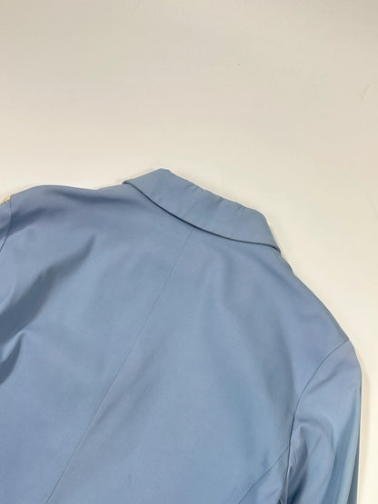 Prada blue striped jacket in nylon and silk with logo detailing.