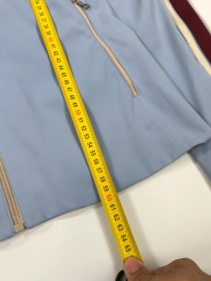 Prada blue striped jacket in nylon and silk with logo detailing.