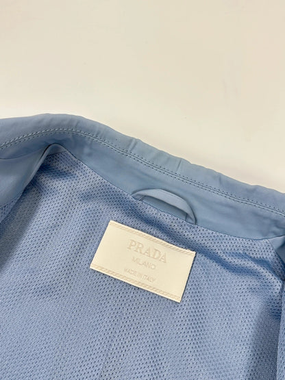 Prada blue striped jacket in nylon and silk with logo detailing.