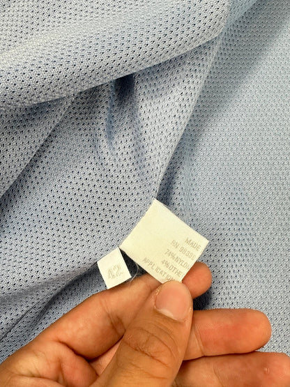 Prada blue striped jacket in nylon and silk with logo detailing.