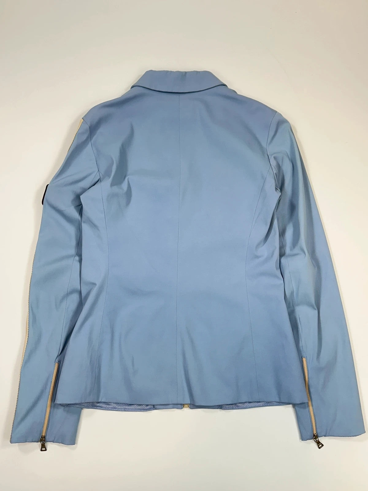 Prada blue striped jacket in nylon and silk with logo detailing.