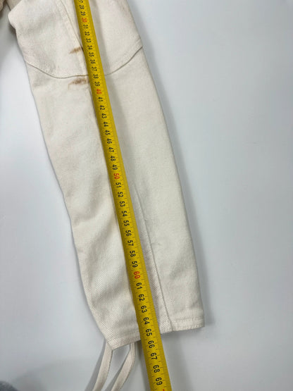 Prada brown and white denim jacket with lace detailing and faded wash effect.